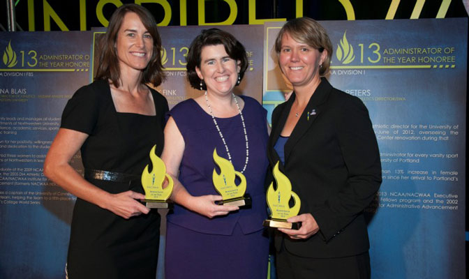 Karen Peters (middle) was honored by NACWAA as the Division I Administrator of the Year in 2013.